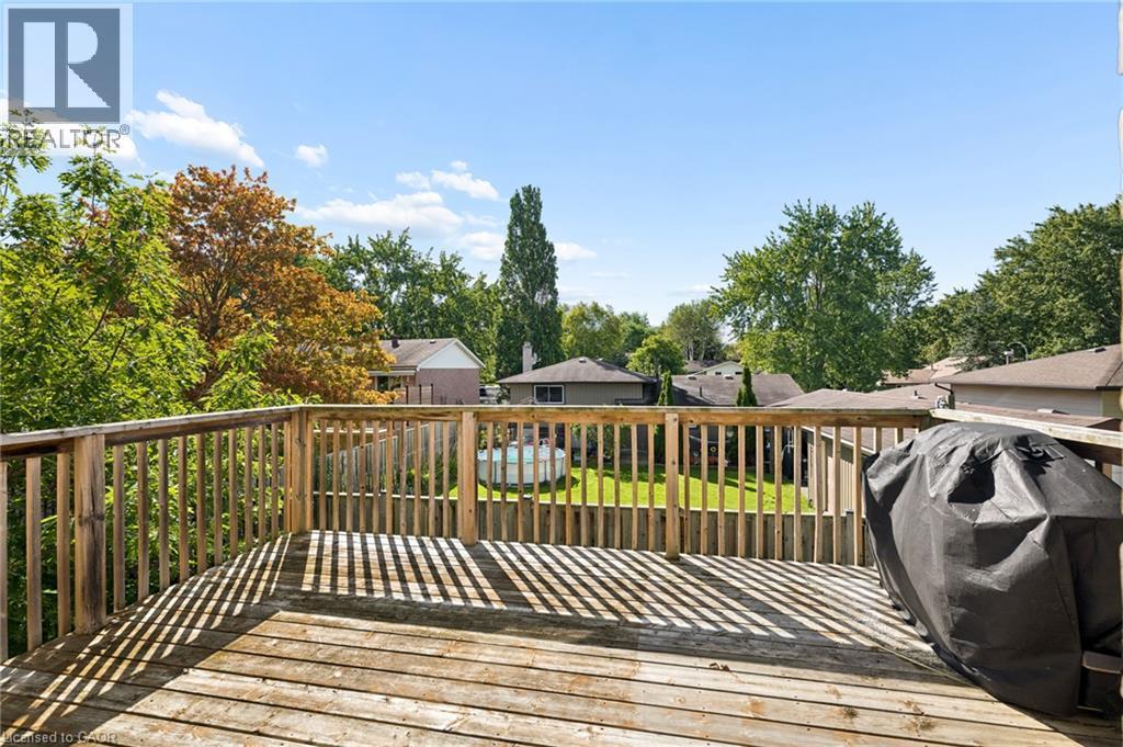 Expansive wood-plank deck with a perimeter railing - 192 Brewery Street Unit# 18, Baden, ON