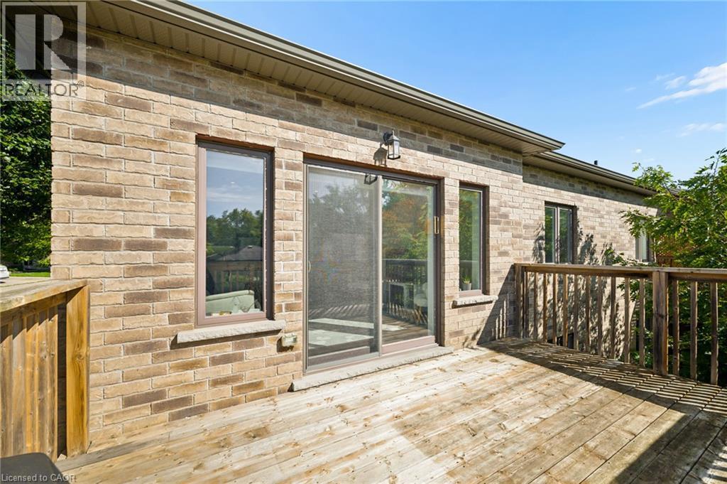Exterior brick, wood deck, sliding glass door - 192 Brewery Street Unit# 18, Baden, ON