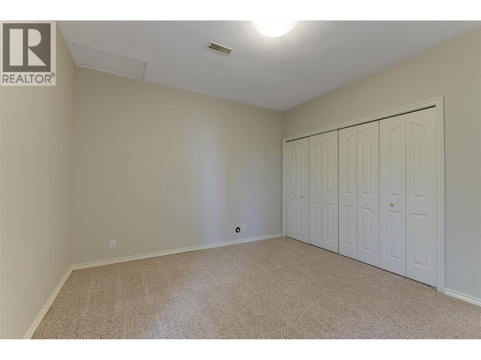 Fourth bedroom on the lower level - 4632 / 4624 Minto Street, Peachland, BC