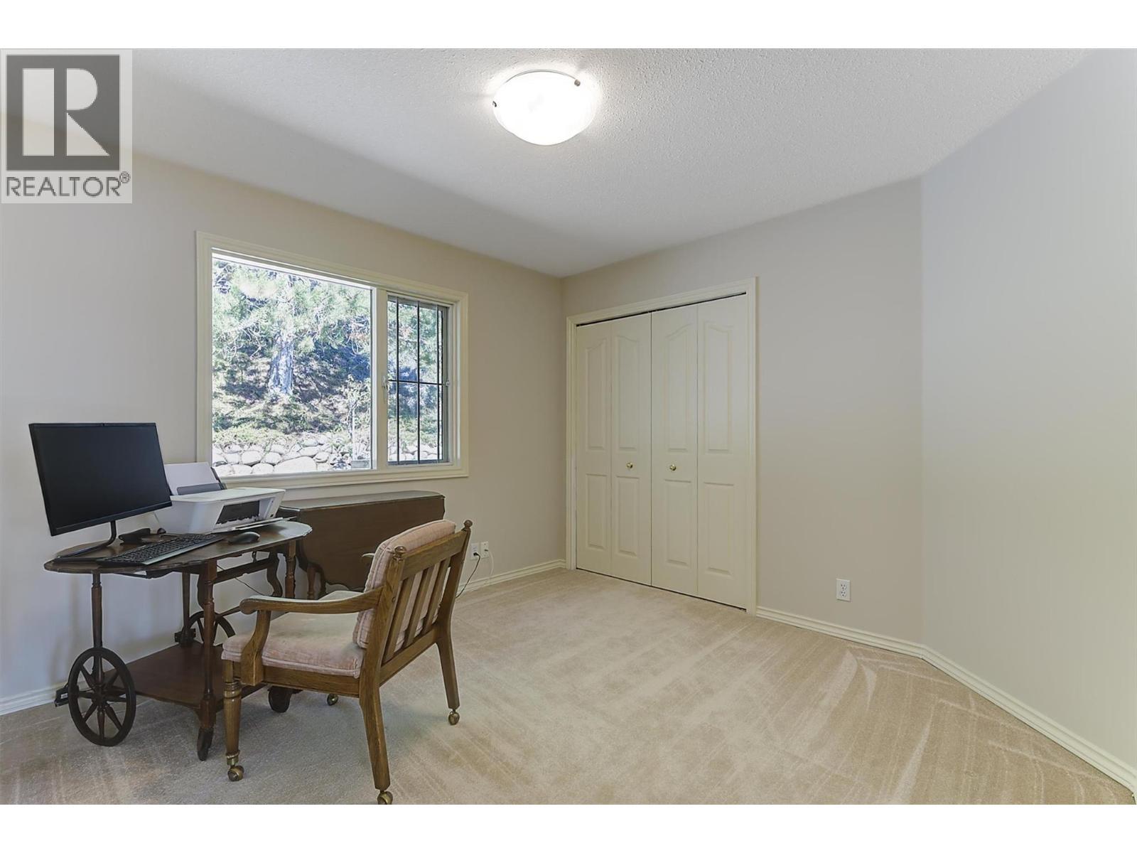 Second bedroom on the upper level - 4632 / 4624 Minto Street, Peachland, BC