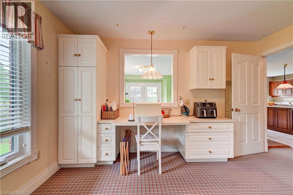 The oversized laundry room offers a great spot for your hobbies - 11 Lorraine Drive, Linwood, ON
