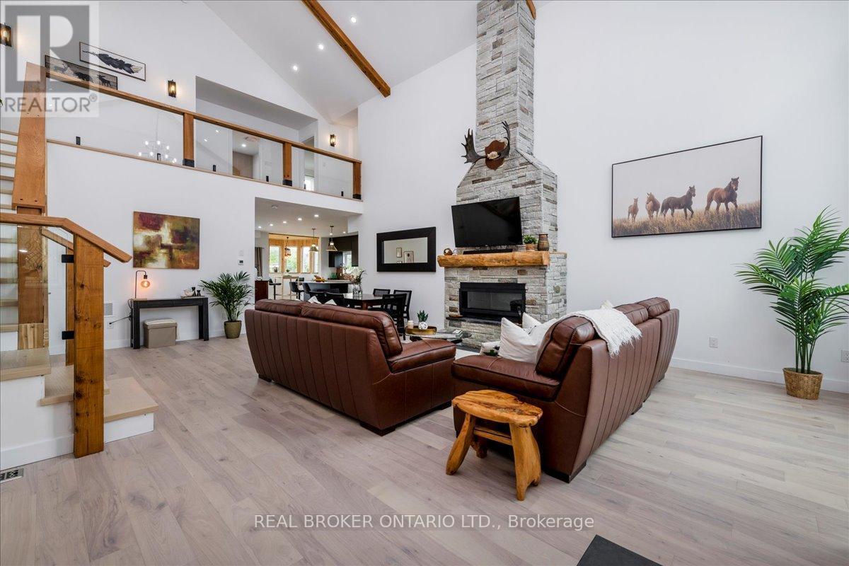 3665 Baldwick Lane, Springwater, ON - Indoor With Fireplace
