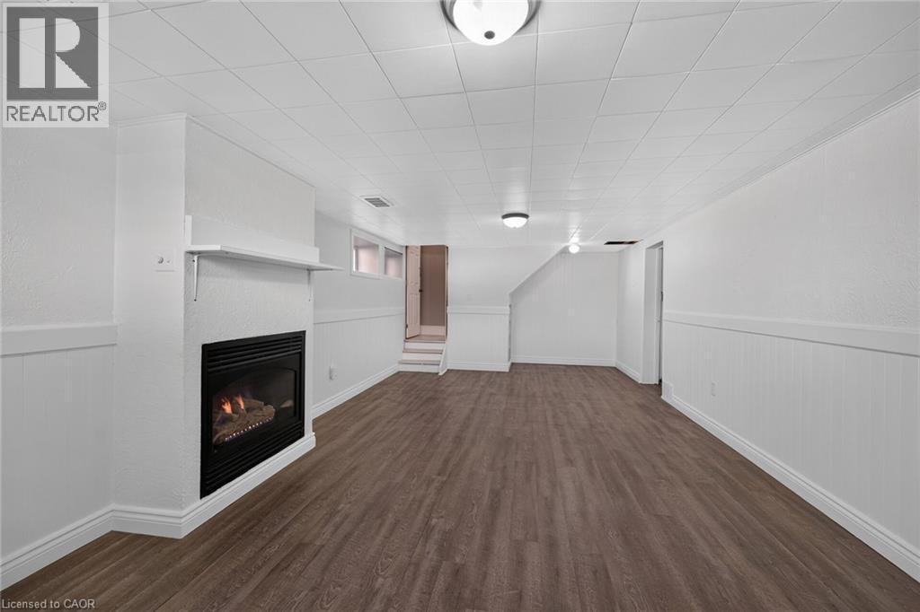 89 Wise Crescent, Hamilton, ON - Indoor Photo Showing Other Room With Fireplace