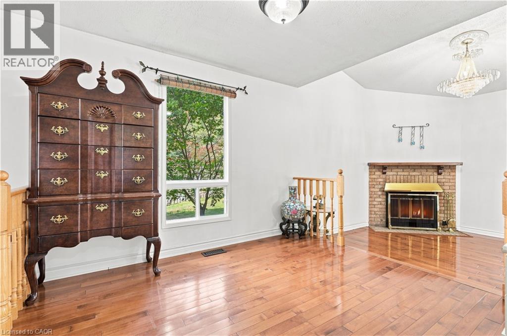 34 Lisajane Court, Hamilton, ON - Indoor Photo Showing Other Room With Fireplace
