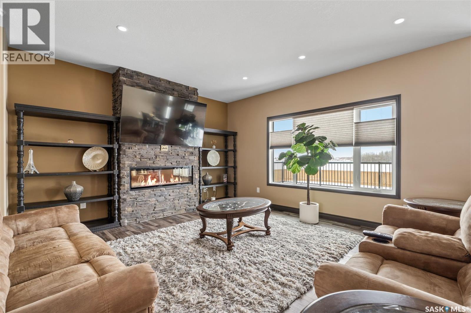 503 8Th Avenue E, Watrous, SK - Indoor Photo Showing Living Room With Fireplace
