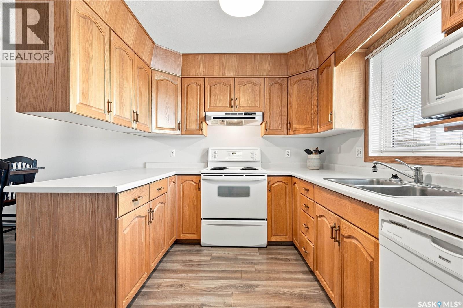 308 115 Keevil Crescent, Saskatoon, SK - Indoor Photo Showing Kitchen With Double Sink