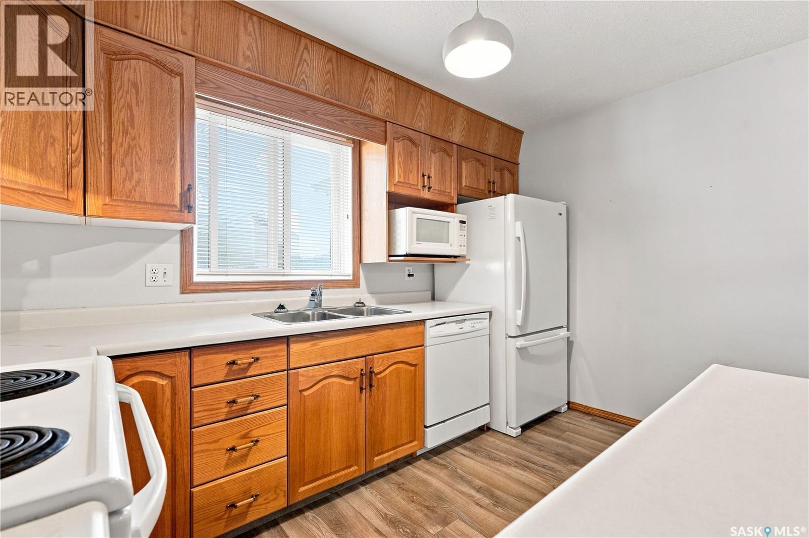 308 115 Keevil Crescent, Saskatoon, SK - Indoor Photo Showing Kitchen With Double Sink