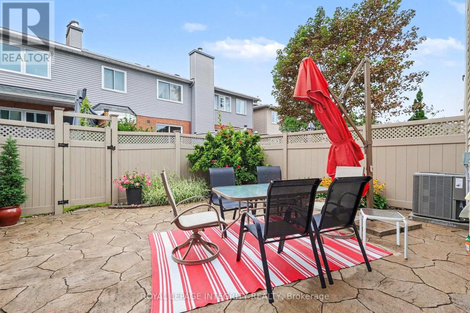 Low maintenance back yard - 16 Streamwood Lane, Ottawa, ON - Outdoor With Deck Patio Veranda