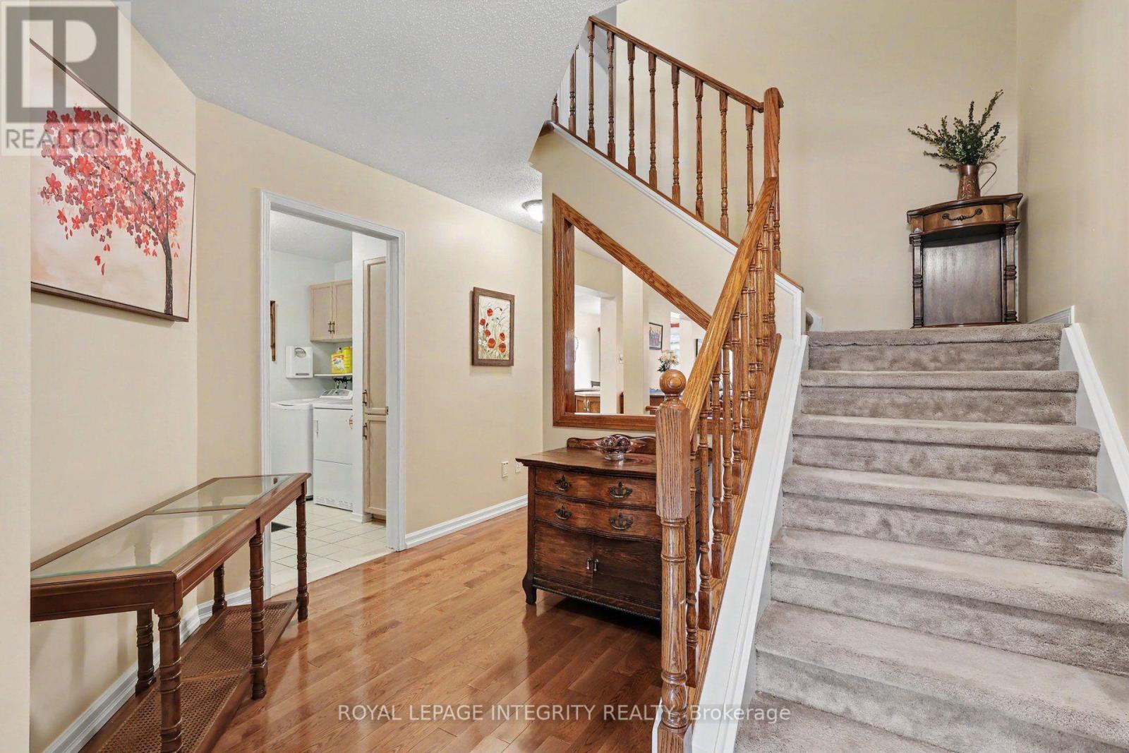 Proceed to the main floor living area or upstairs - 16 Streamwood Lane, Ottawa, ON - Indoor Photo Showing Other Room