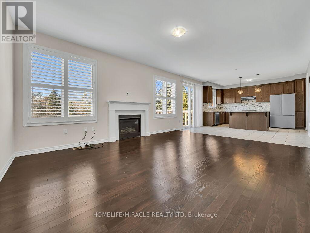 52 Compass Trail, Cambridge, ON - Indoor Photo Showing Living Room With Fireplace