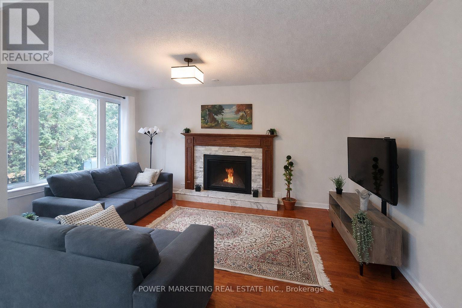 29 Taj Court, Ottawa, ON - Indoor Photo Showing Living Room With Fireplace