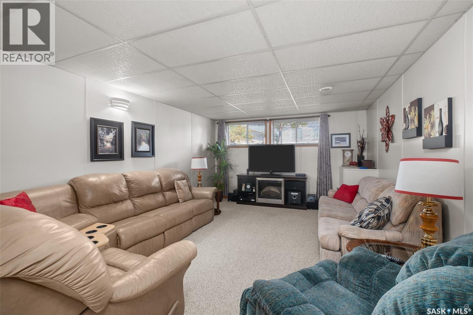 21 Plaxton Place, Prince Albert, SK - Indoor Photo Showing Living Room