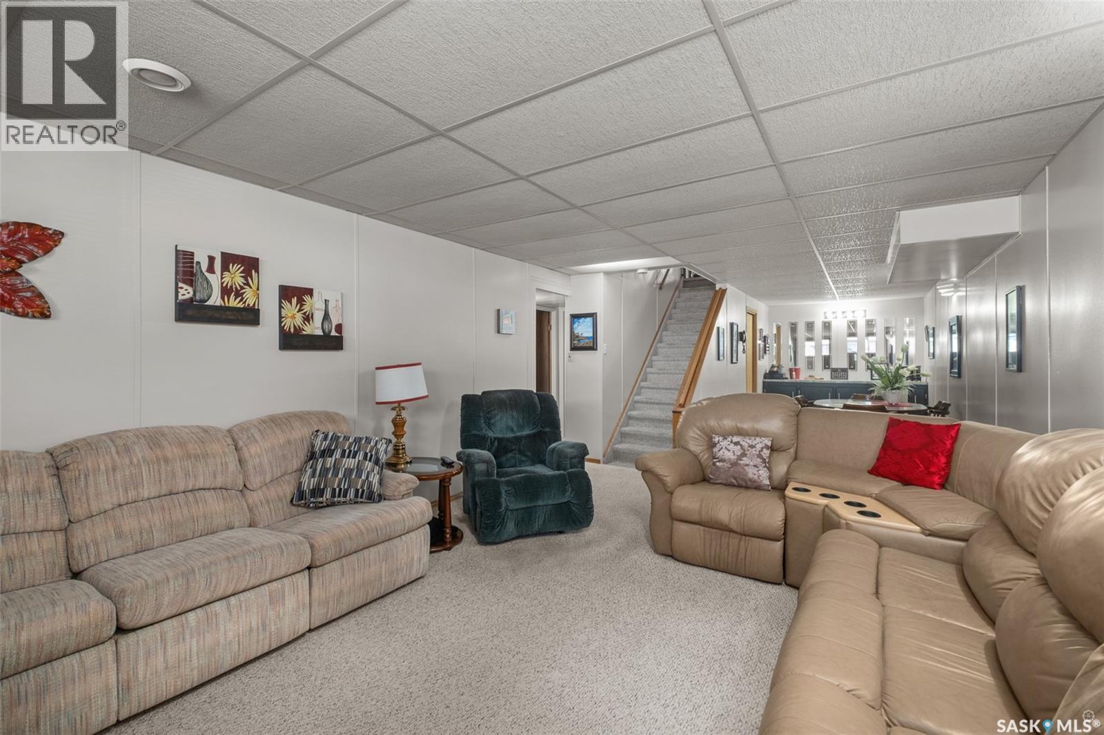 21 Plaxton Place, Prince Albert, SK - Indoor Photo Showing Living Room