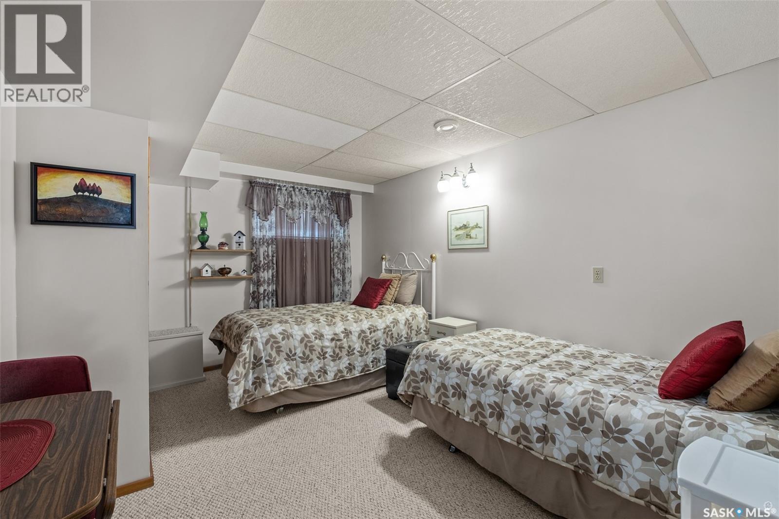 21 Plaxton Place, Prince Albert, SK - Indoor Photo Showing Bedroom