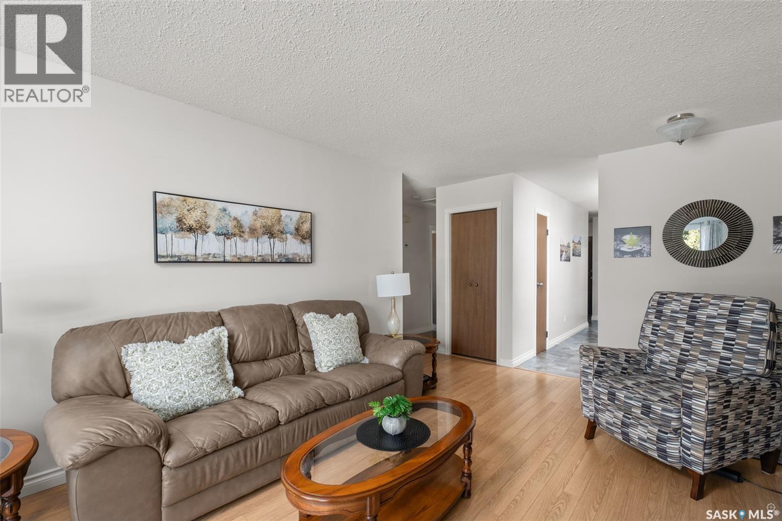 21 Plaxton Place, Prince Albert, SK - Indoor Photo Showing Living Room