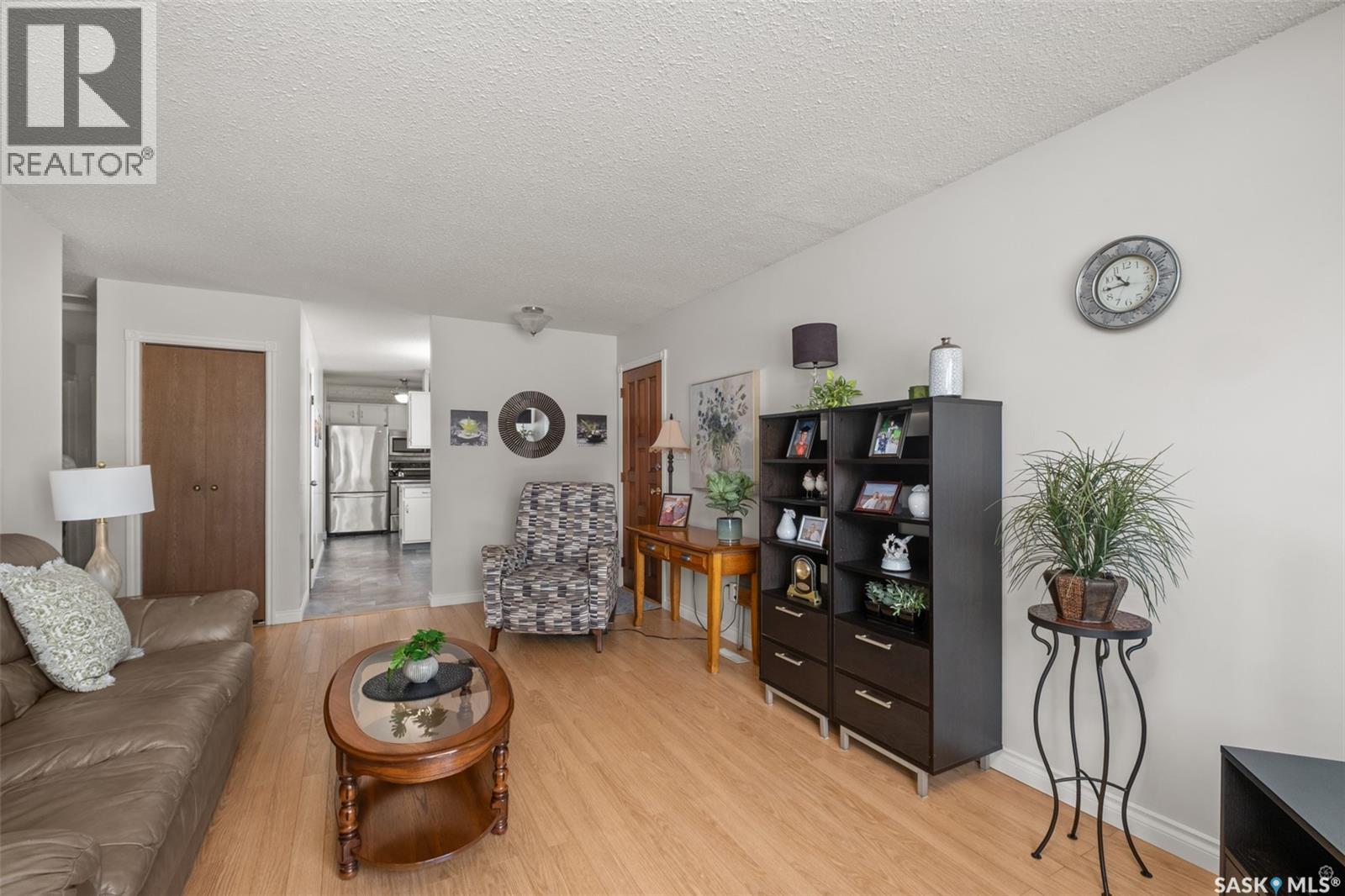 21 Plaxton Place, Prince Albert, SK - Indoor Photo Showing Living Room