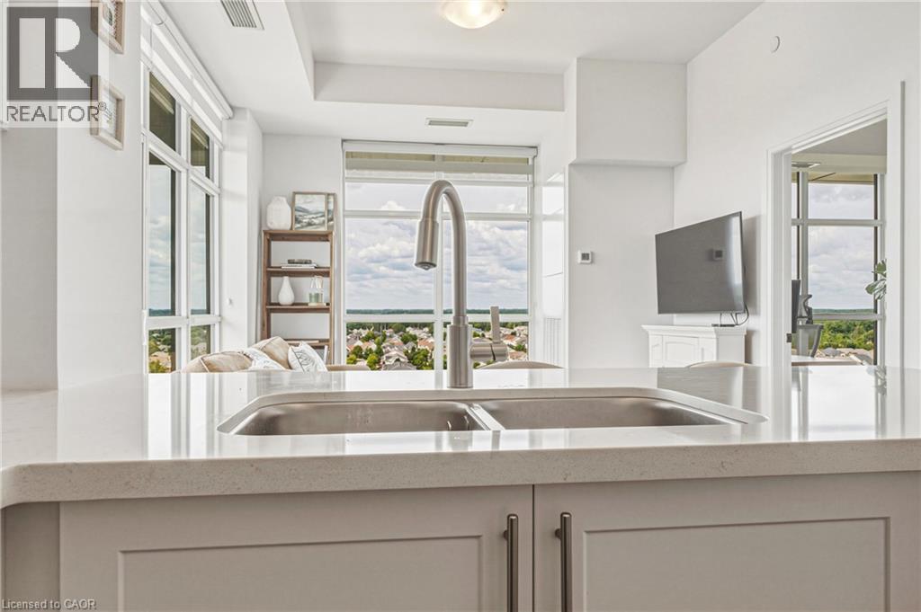470 E Dundas Street E Unit# 1202, Waterdown, ON - Indoor Photo Showing Kitchen With Double Sink