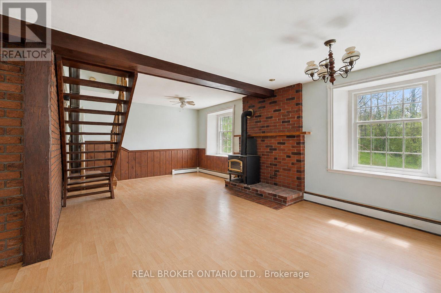 Living/Dining Rooms (Furniture Virtually Removed) - 36 Elgin Street E, Woolwich, ON - Indoor With Fireplace