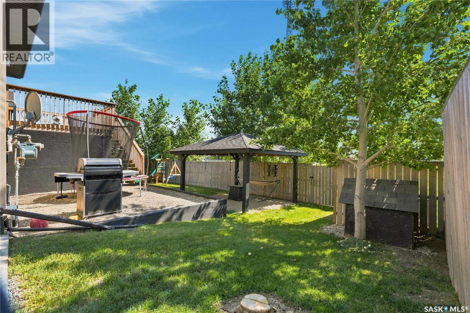 104 Mcdonald Street, Aberdeen, SK - Outdoor With Backyard