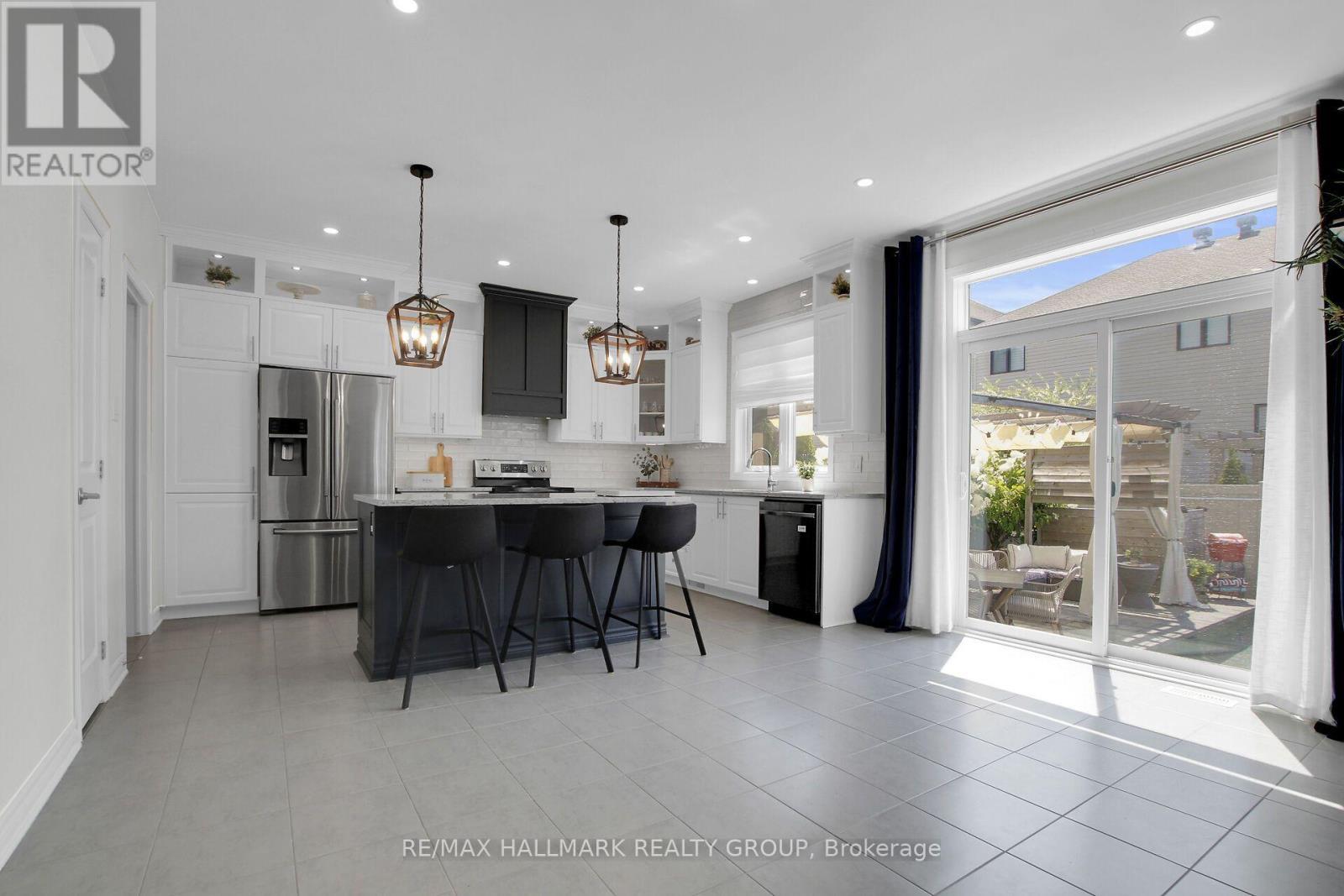 Easy access to the patio - 636 Eagle Crest Heights, Ottawa, ON - Indoor Photo Showing Kitchen With Upgraded Kitchen