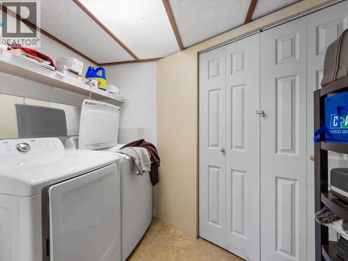 Suite laundry room - 3368 Mciver Road, West Kelowna, BC