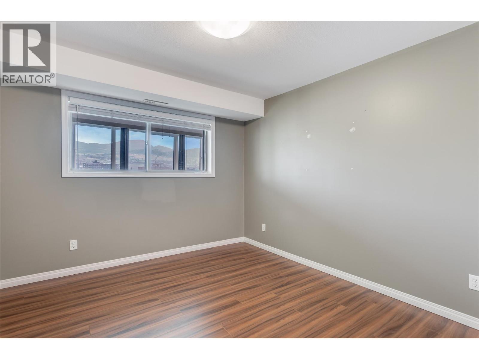 Bedroom 1 - 200 Dougall Road N Unit# 207, Kelowna, BC