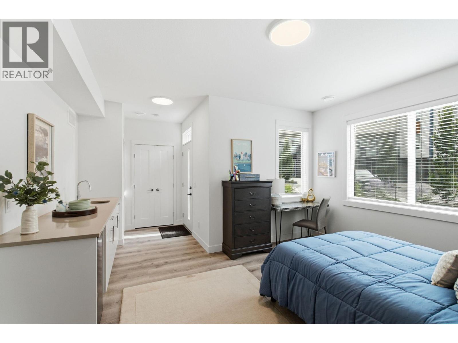 Similar Too - Lower Bedroom with Wet Bar and Separate Entrance - 610 Academy Way Unit# 114, Kelowna, BC