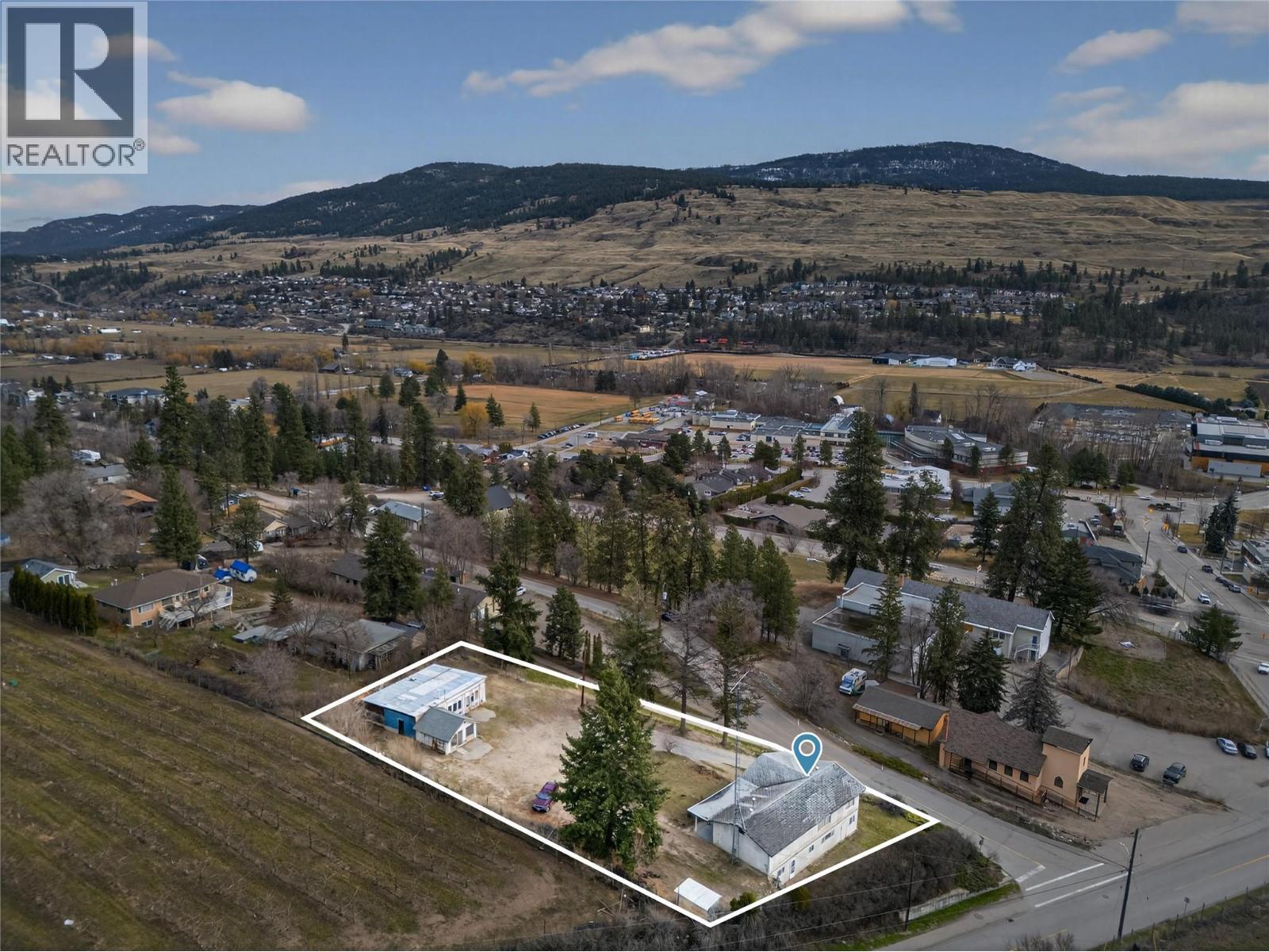 0.6 acre lot zoned C1 – Town Centre Commercial - 10114 Newene Road, Lake Country, BC