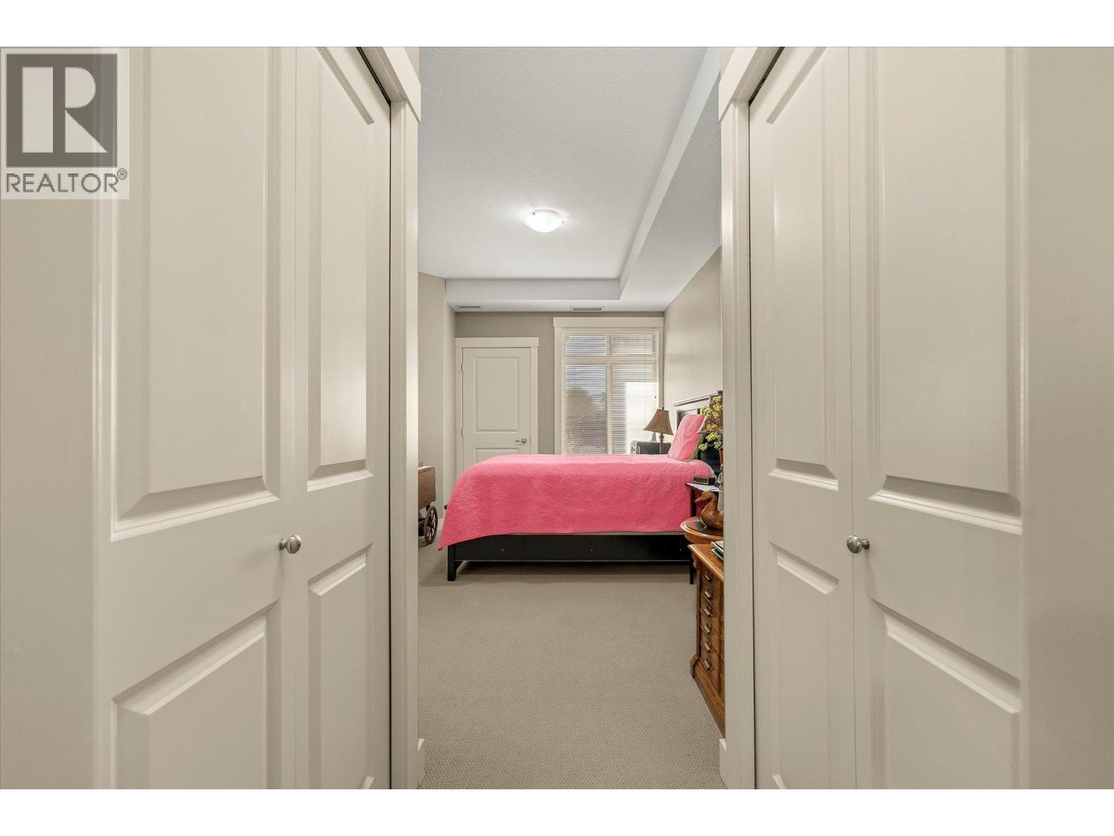 walk through the double closets to the tandem ensuite. - 3545 Carrington Road Unit# 108, West Kelowna, BC