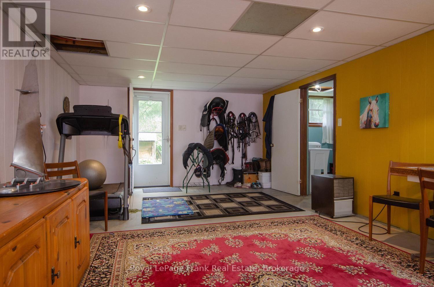 Rec Room With Door To Backyard - 15032 Telephone Road, Brighton, ON