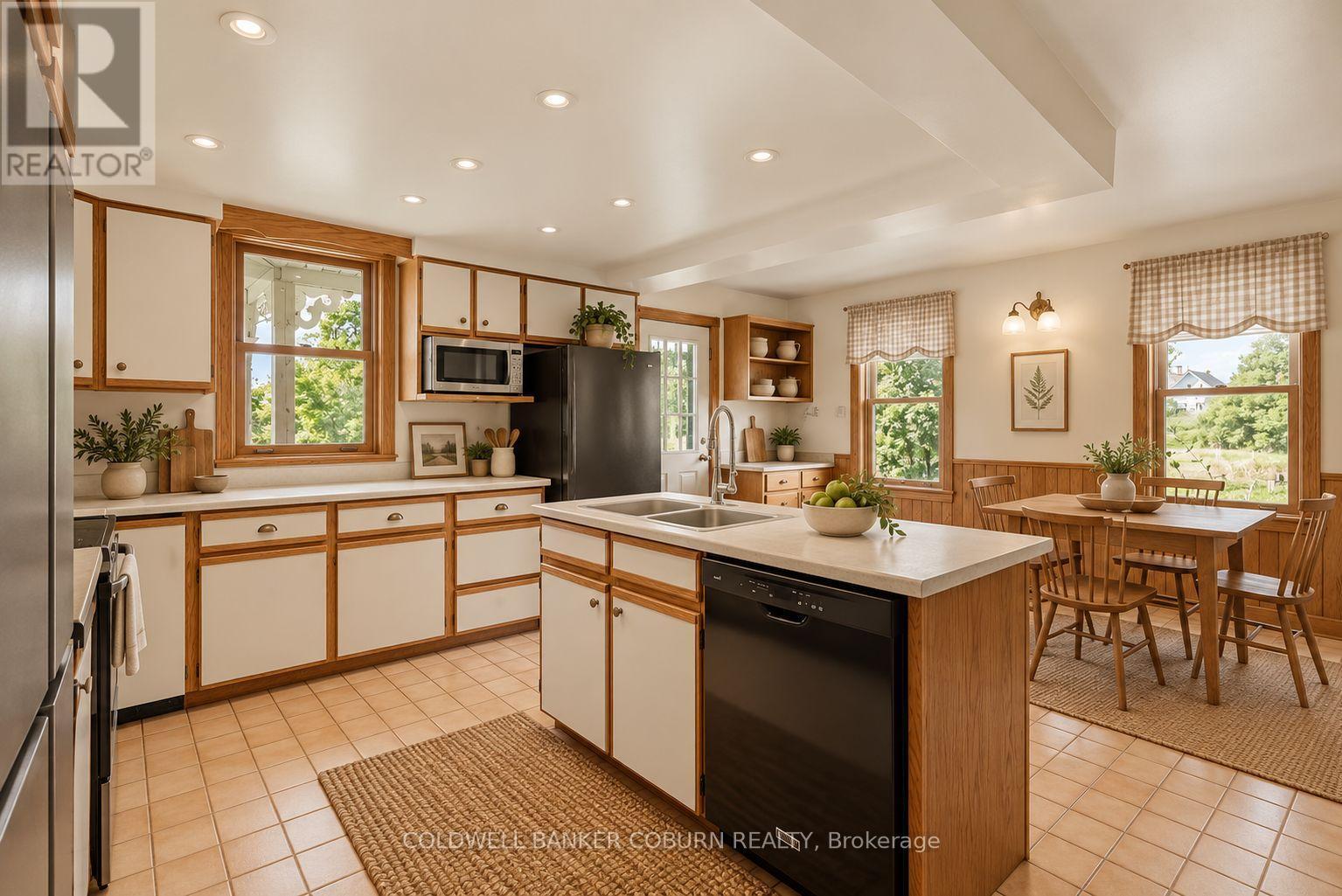 Kitchen with Dining - virtually staged - 14317 County 43 Road, North Stormont, ON