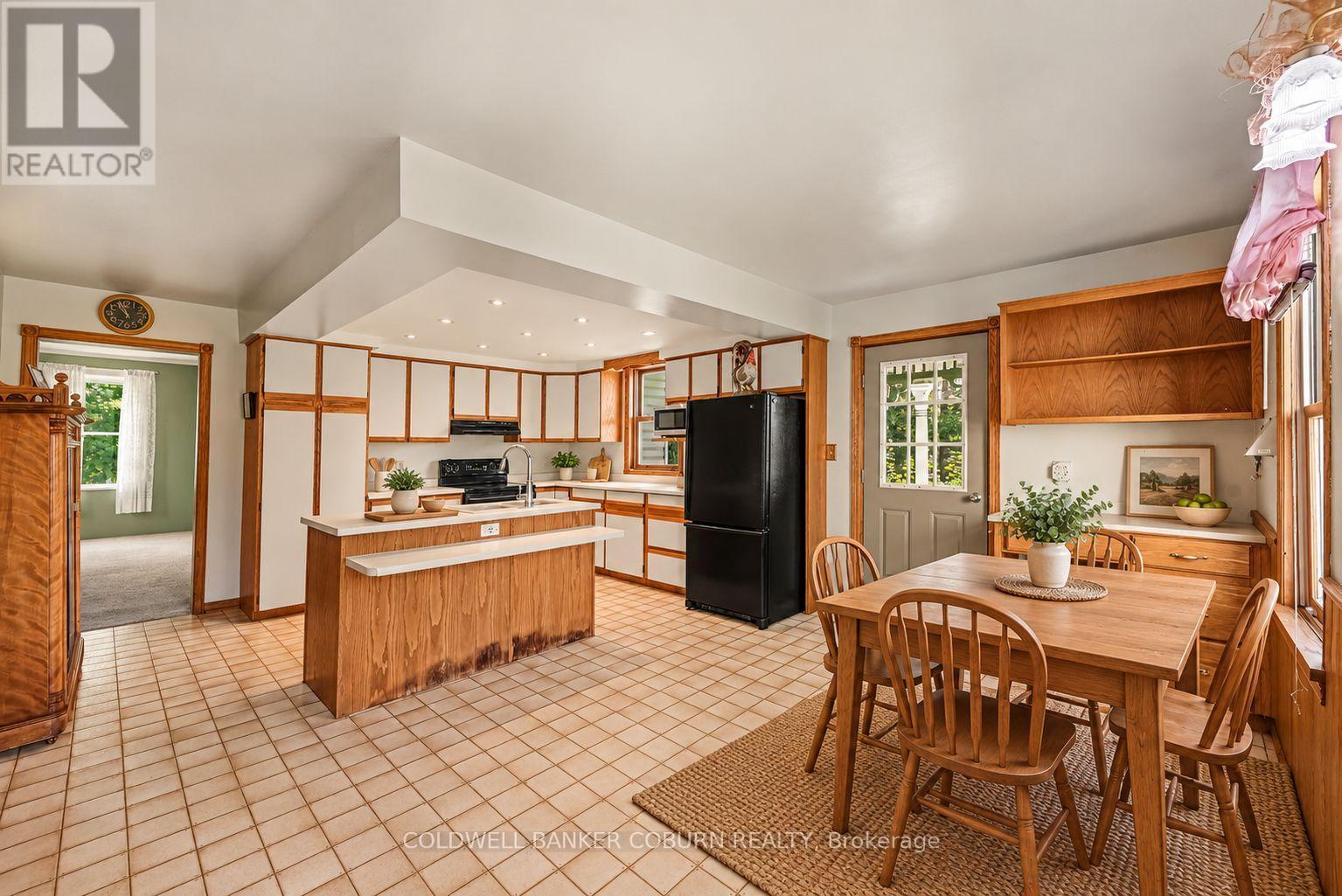 Kitchen with Dining - virtually staged - 14317 County 43 Road, North Stormont, ON