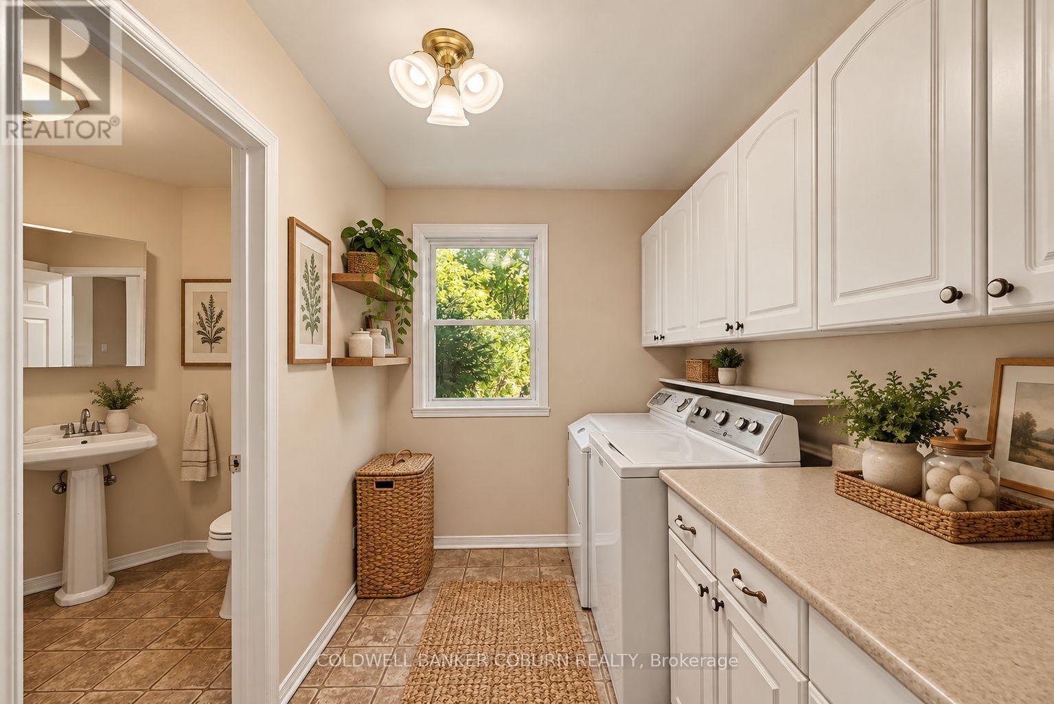 Main floor laundry - virtually staged - 14317 County 43 Road, North Stormont, ON