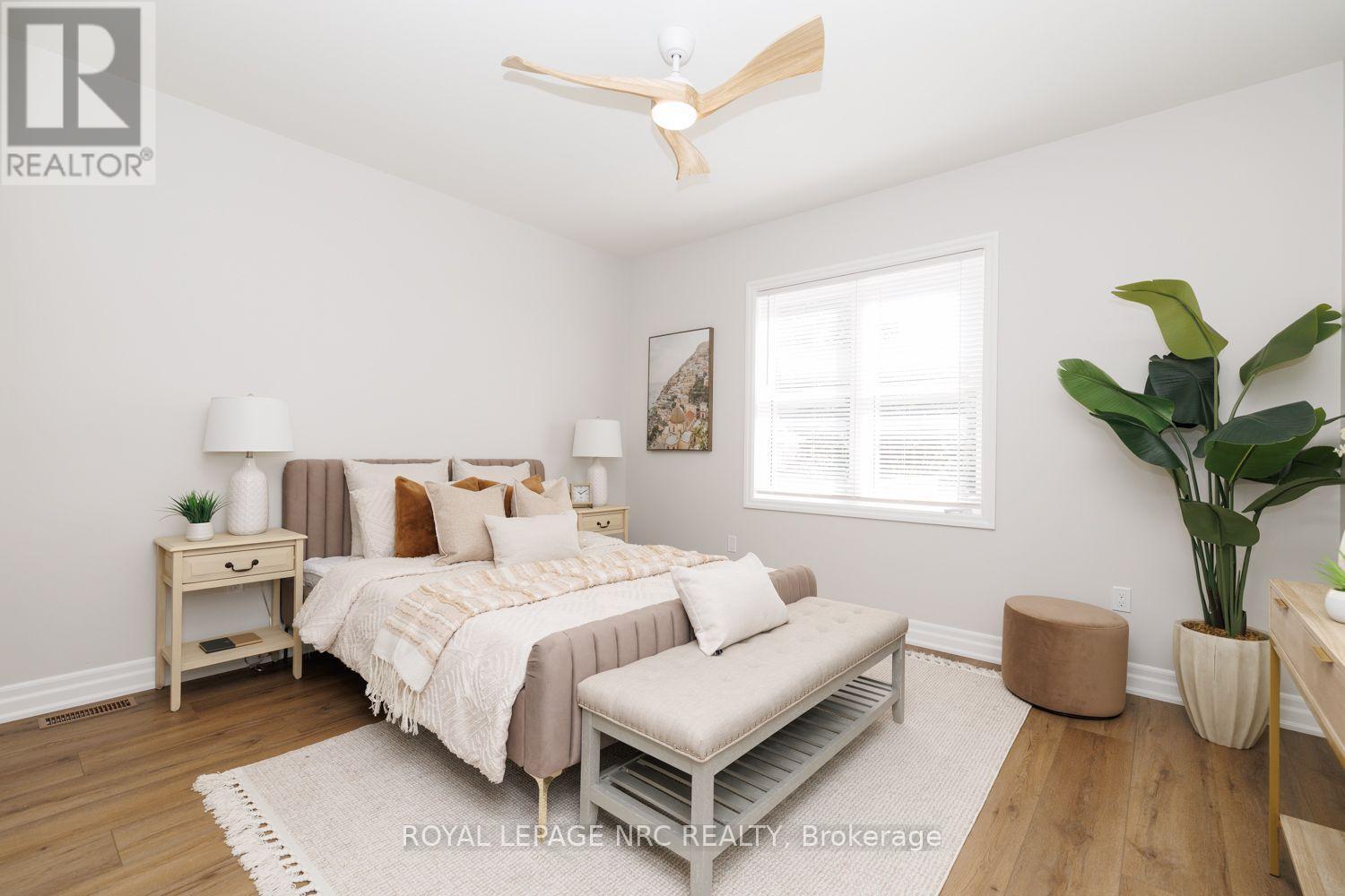 The main floor primary bedroom. - 3 Peel Street, St. Catharines (Port Dalhousie), ON
