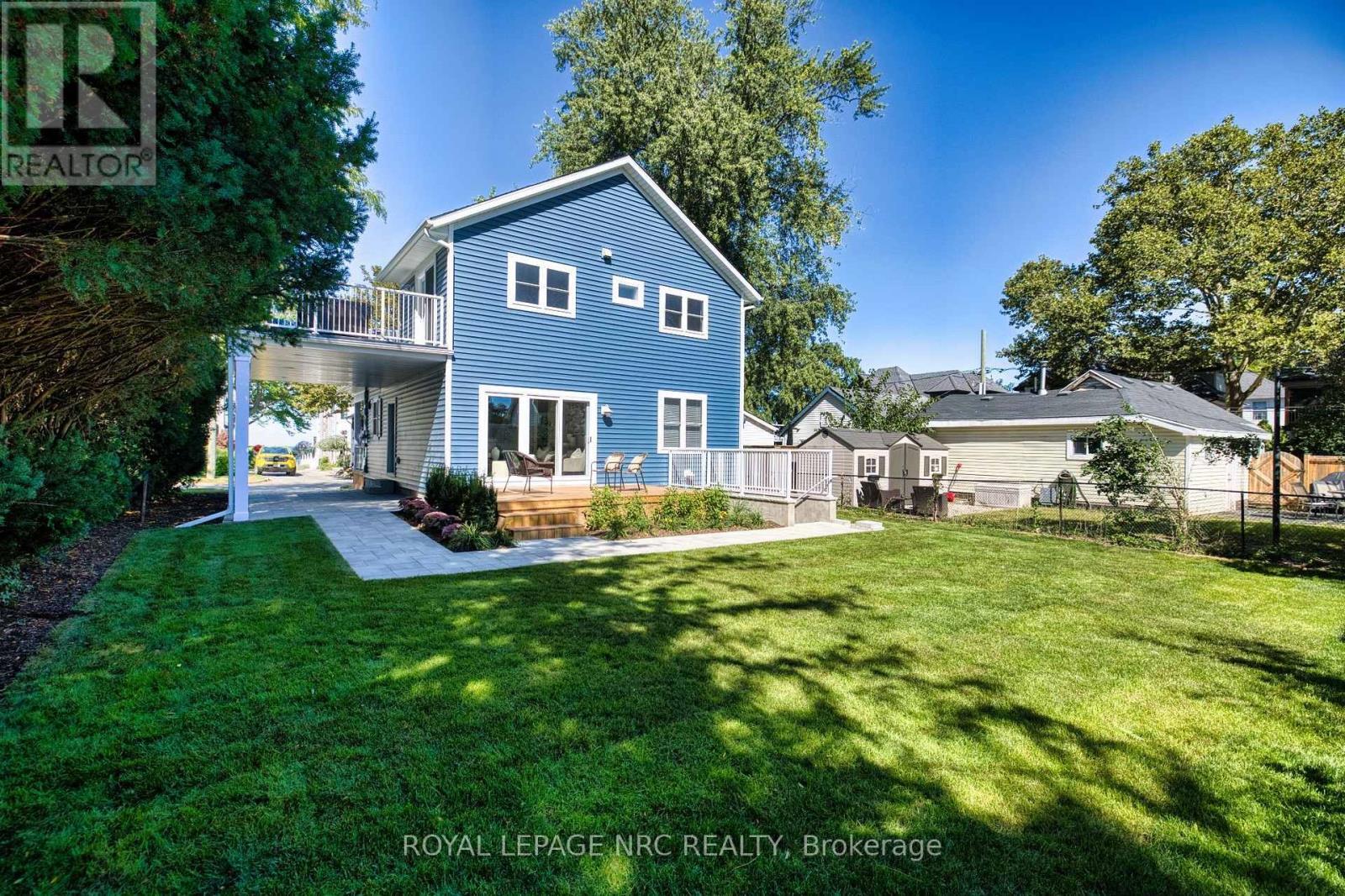 View of the back of the home and balcony. - 3 Peel Street, St. Catharines (Port Dalhousie), ON