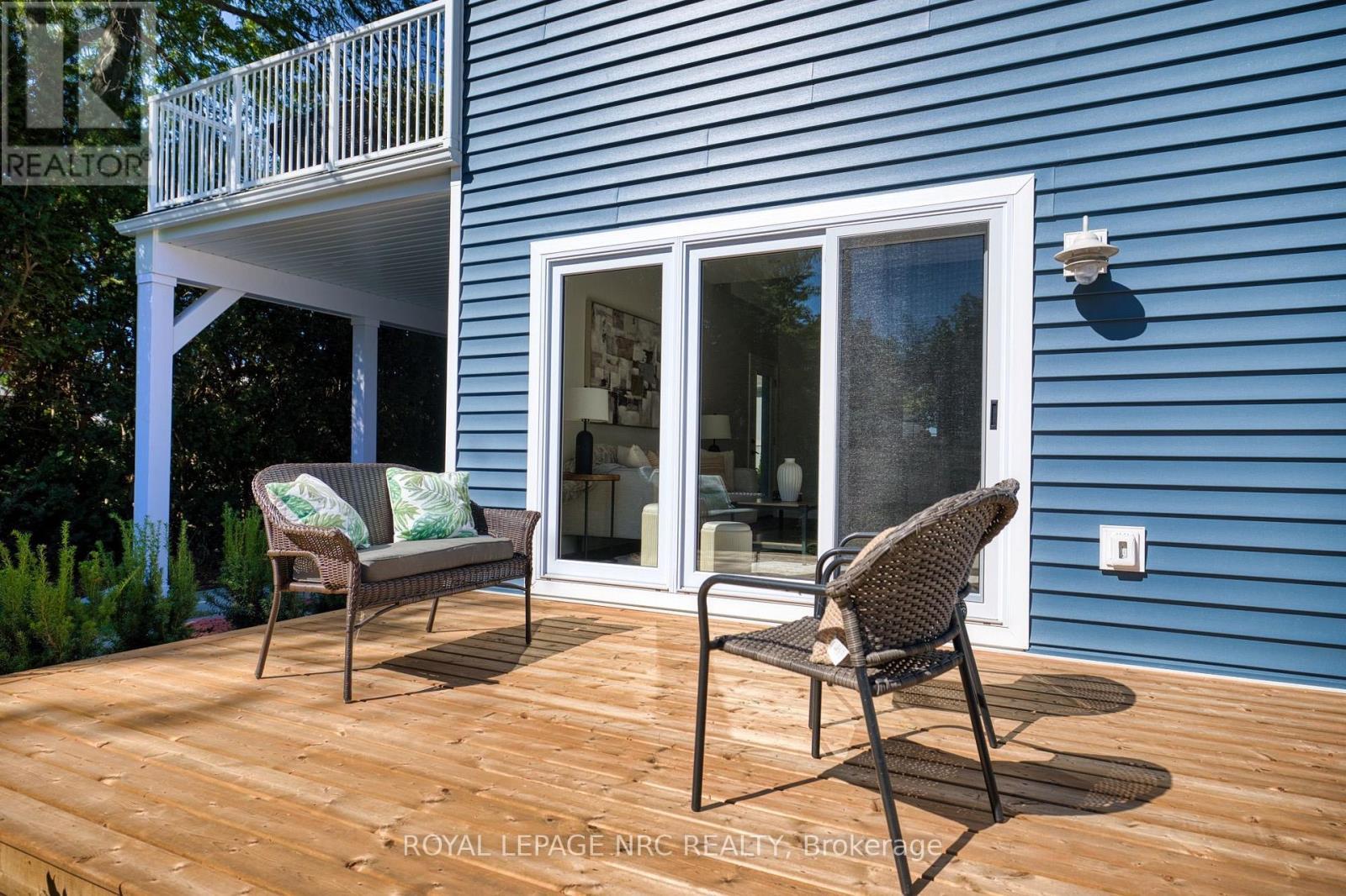 Good sized wooden deck. - 3 Peel Street, St. Catharines (Port Dalhousie), ON