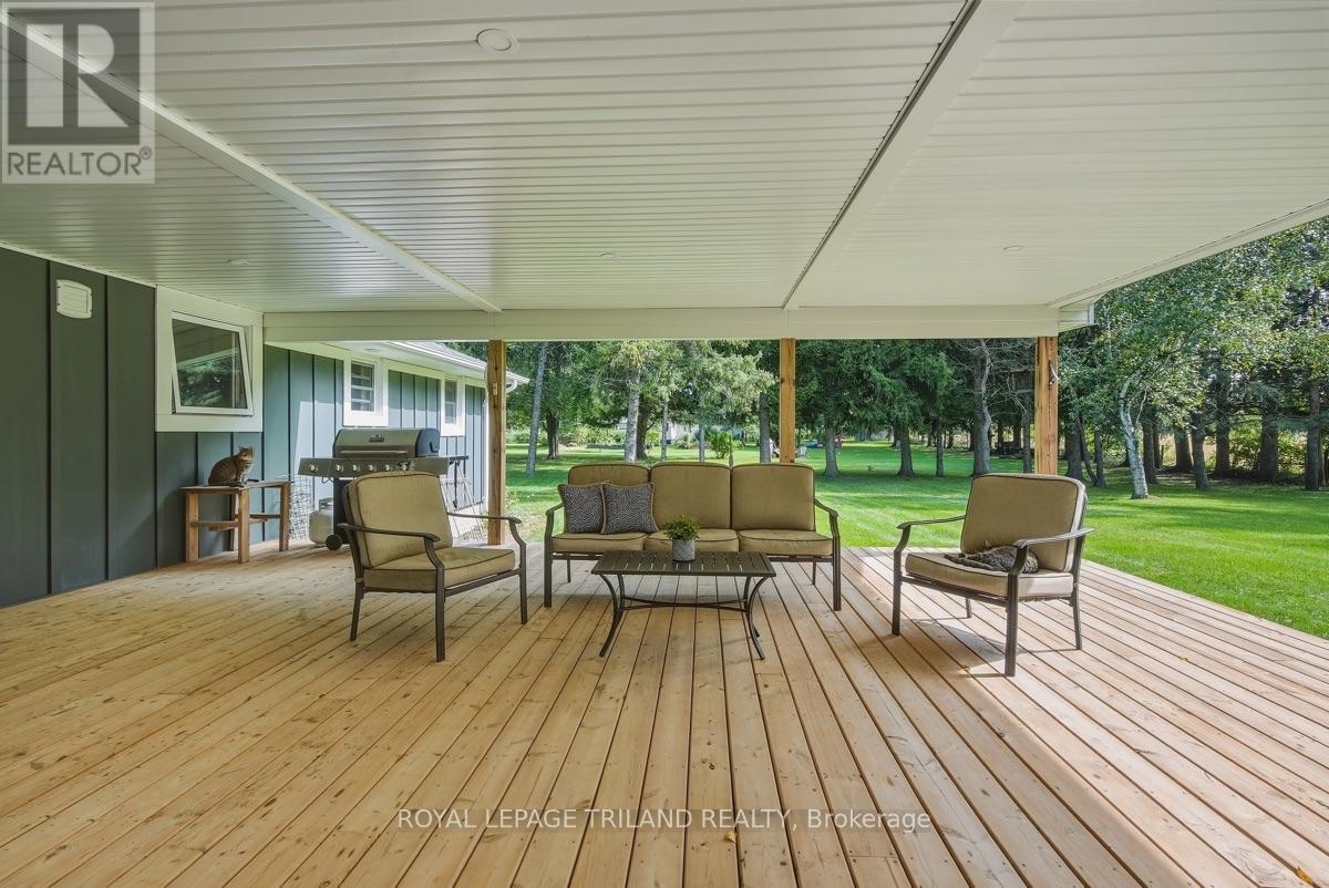 Back Deck: Expansive Covered Back Deck - 15198 St Ignatius Line, Chatham-Kent (Bothwell), ON
