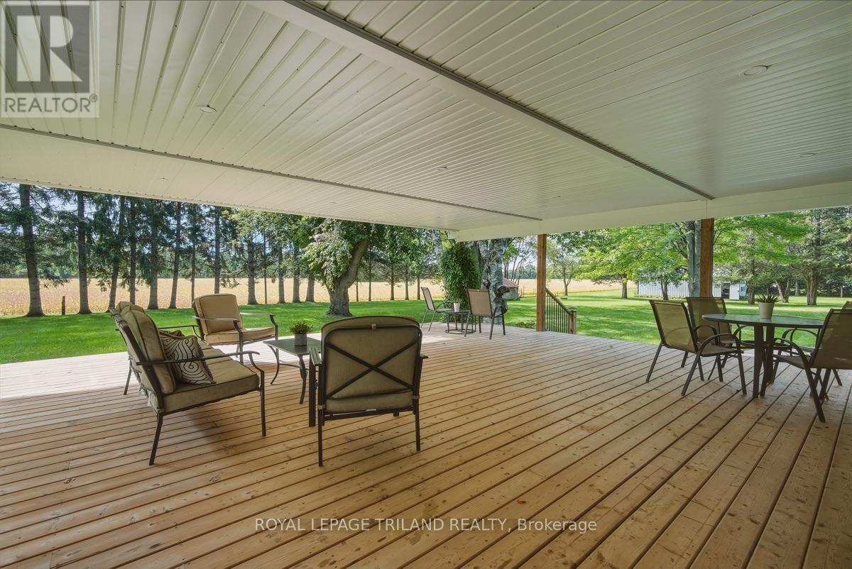 Back Deck: Expansive Covered Back Deck - 15198 St Ignatius Line, Chatham-Kent (Bothwell), ON