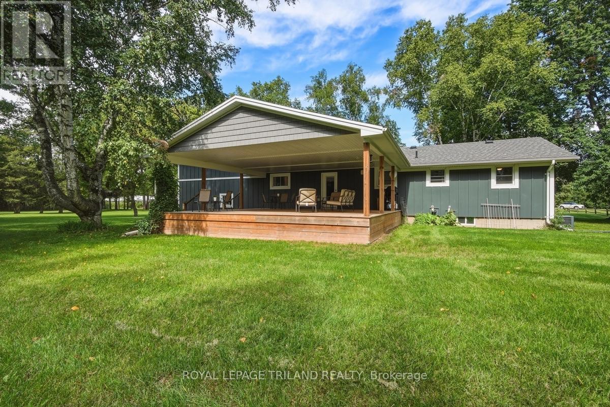 Back Deck: Expansive Covered Back Deck - 15198 St Ignatius Line, Chatham-Kent (Bothwell), ON