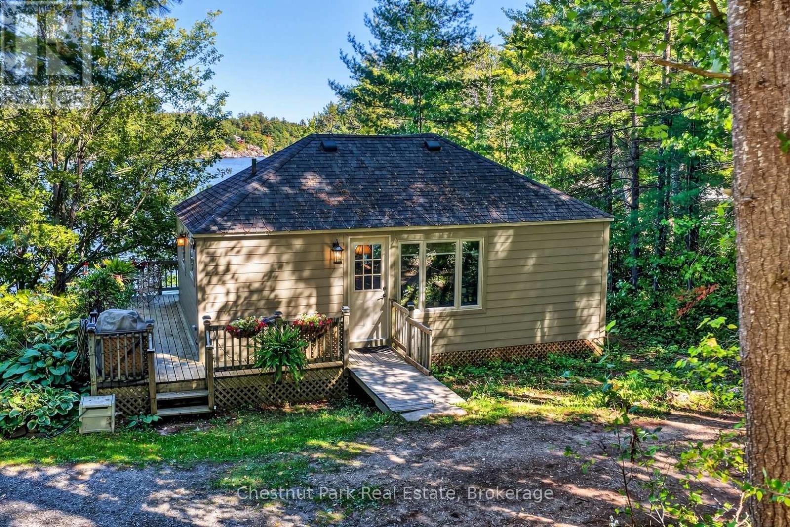 Wrap-Around Porch & Parking Right at Your Door - 1048 Nora Lane, Gravenhurst (Ryde), ON