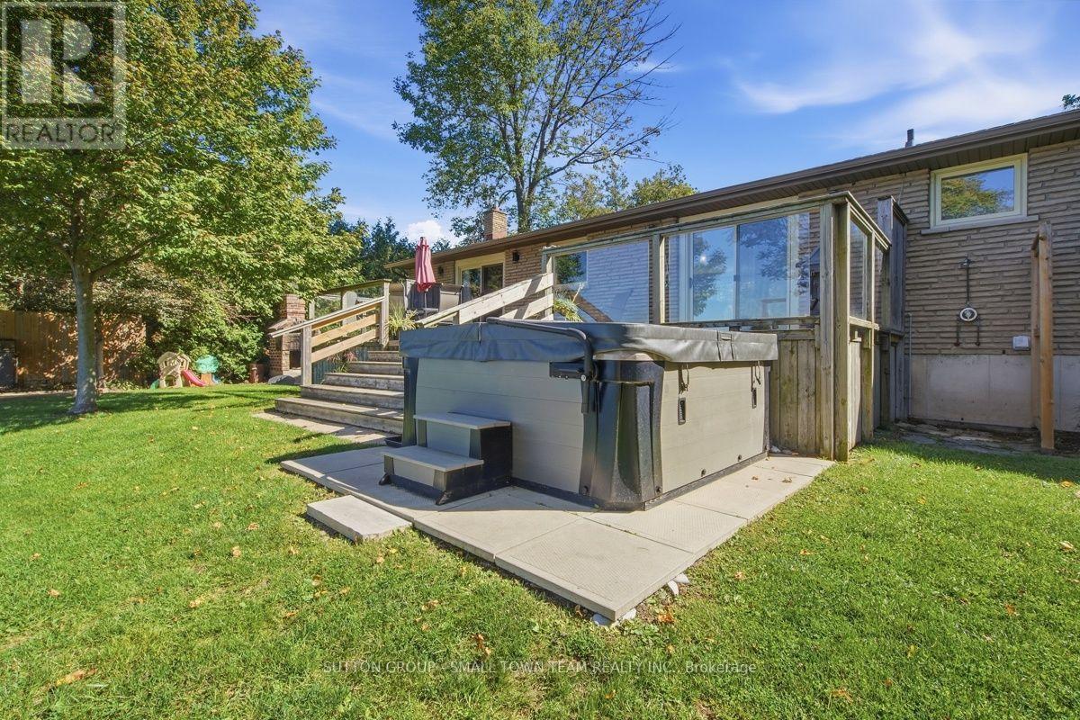 Hot tub overlooking the lake - 74399 Cardinal Court, Bluewater (Stanley), ON