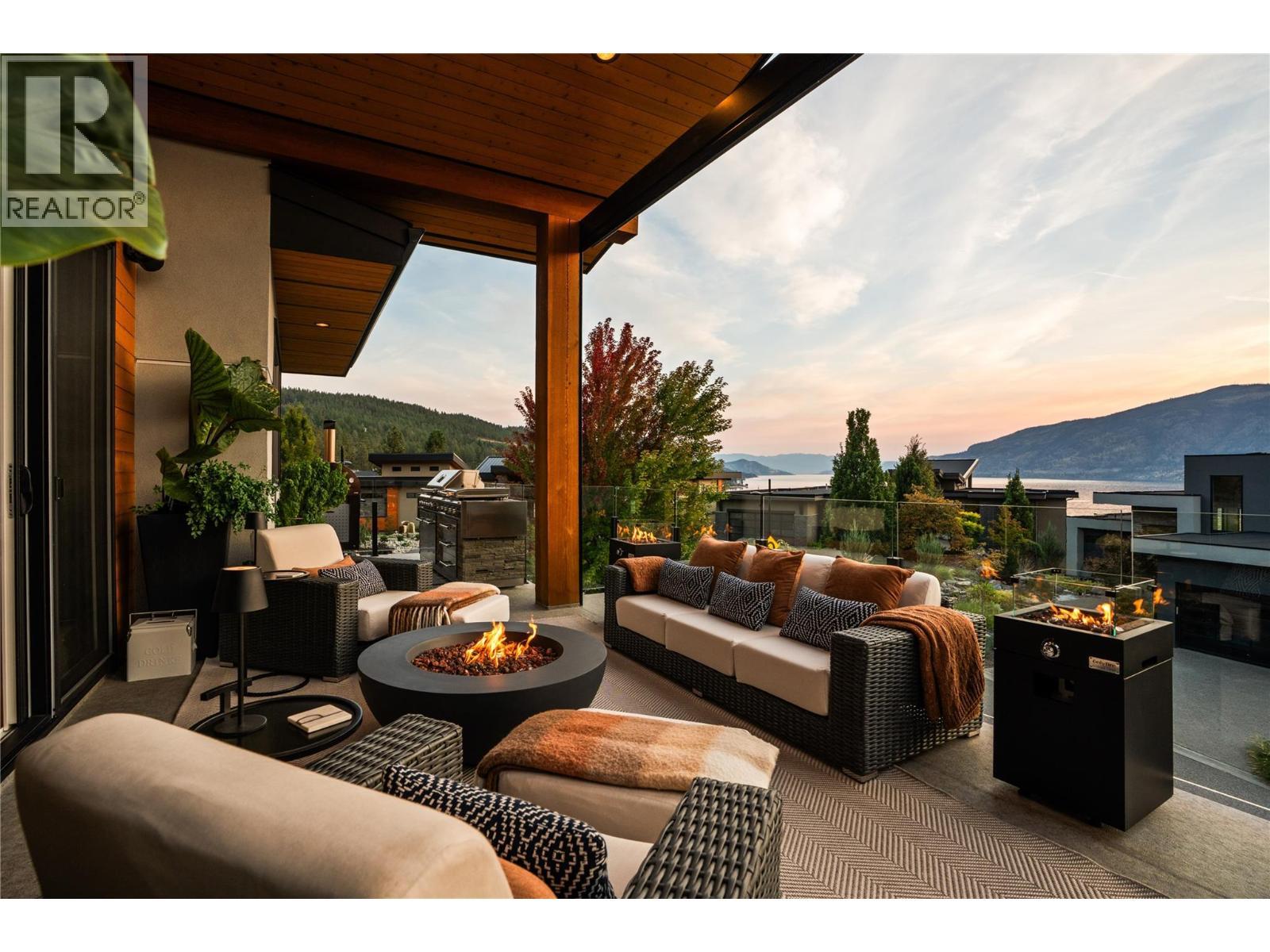 Outdoor living at twilight - 1666 Lakestone Drive, Lake Country, BC