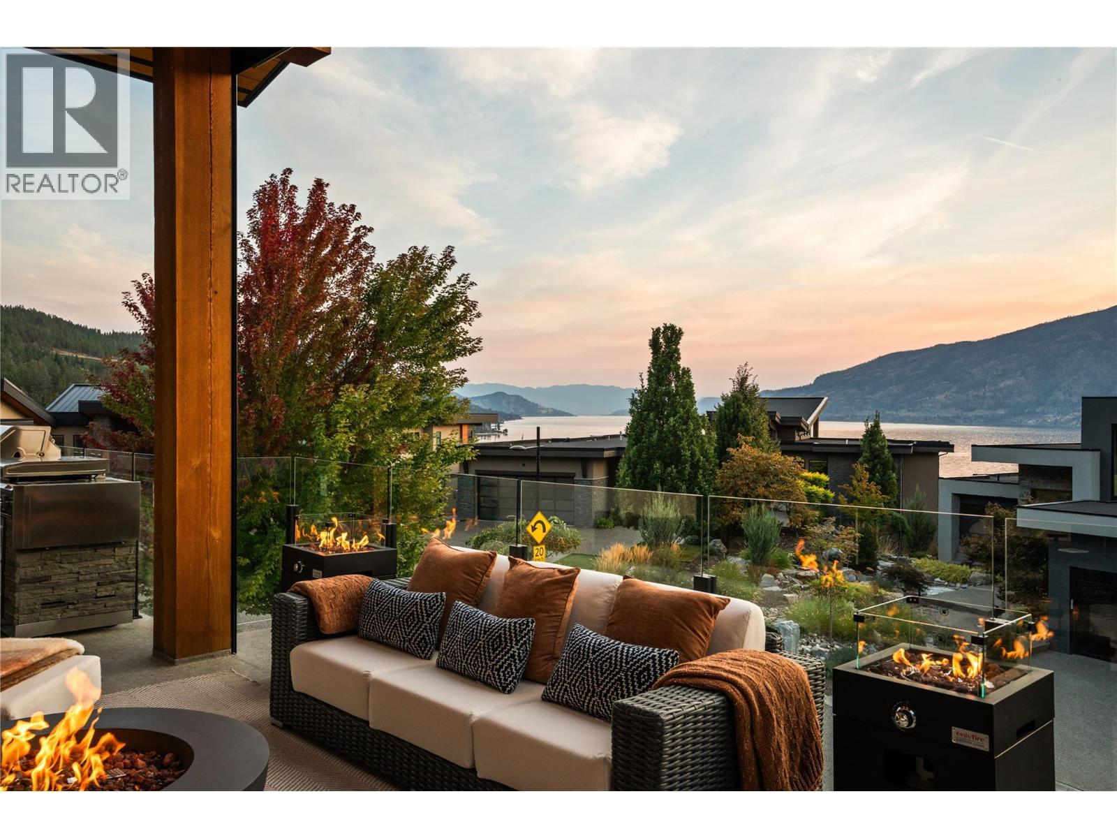 Outdoor living at twilight - 1666 Lakestone Drive, Lake Country, BC