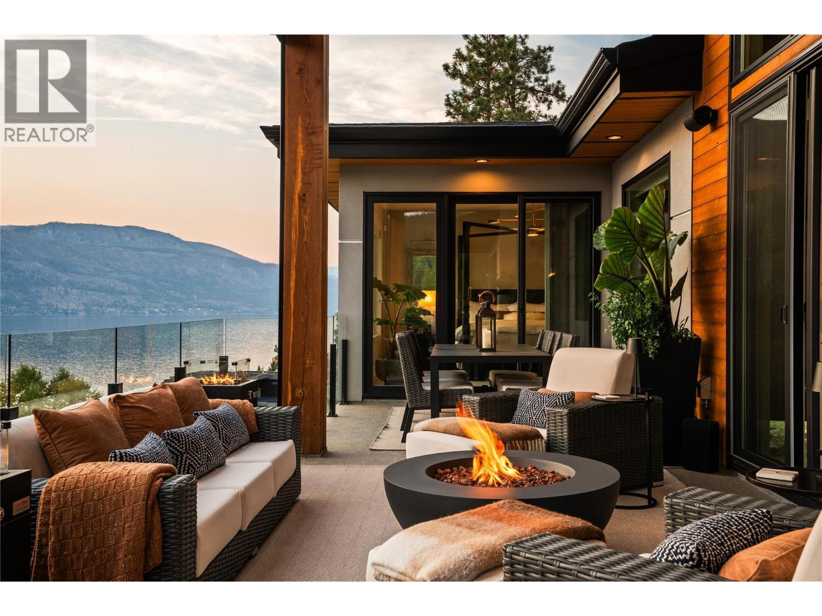 Outdoor living at twilight - 1666 Lakestone Drive, Lake Country, BC
