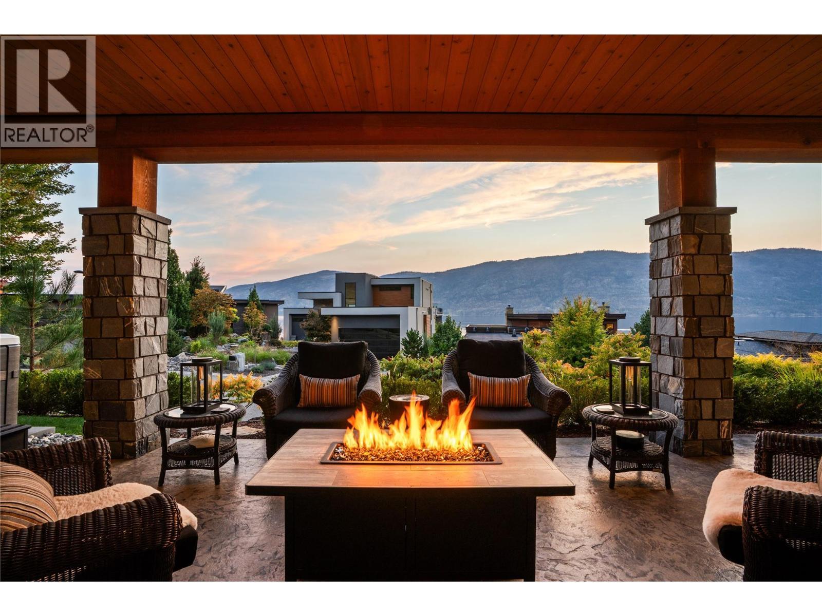 Family Patio (lower level) at twilight - 1666 Lakestone Drive, Lake Country, BC