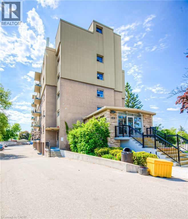 View of property with stairs - 283 Fairway Road N Unit# 501, Kitchener, ON