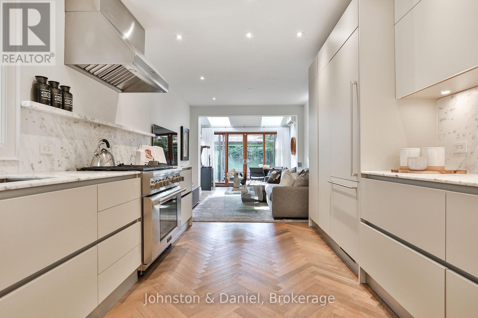 Calcutta marble counters and backsplash - 69 Sullivan Street, Toronto, ON