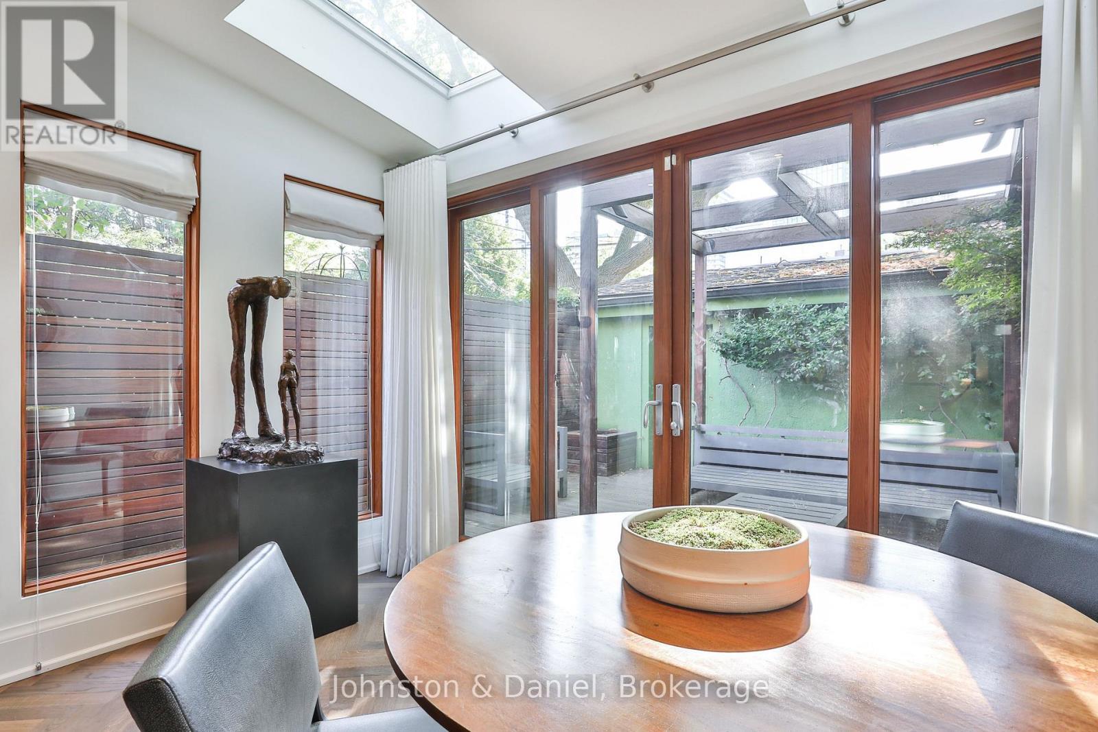 Sun-filled windows & skylights overlooking garden - 69 Sullivan Street, Toronto, ON