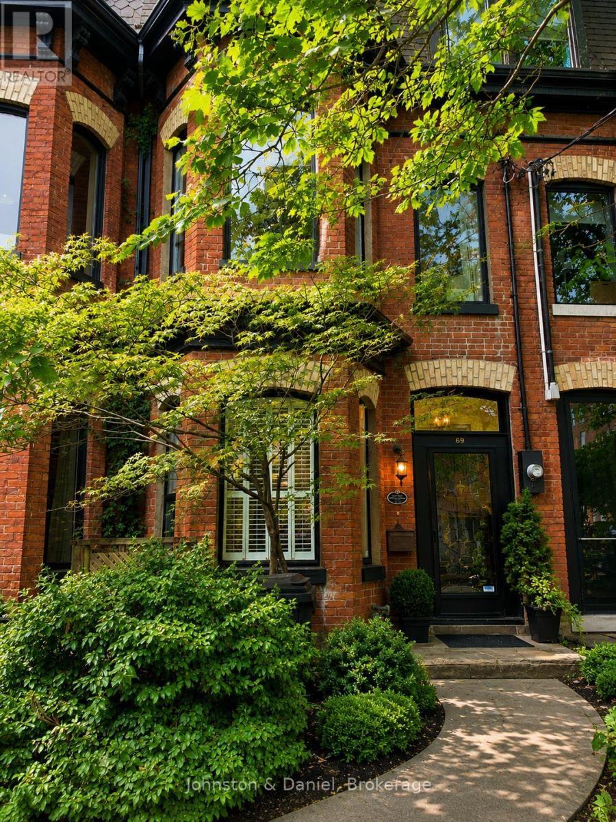 Striking red brick Victorian w/ polychrome facade - 69 Sullivan Street, Toronto, ON