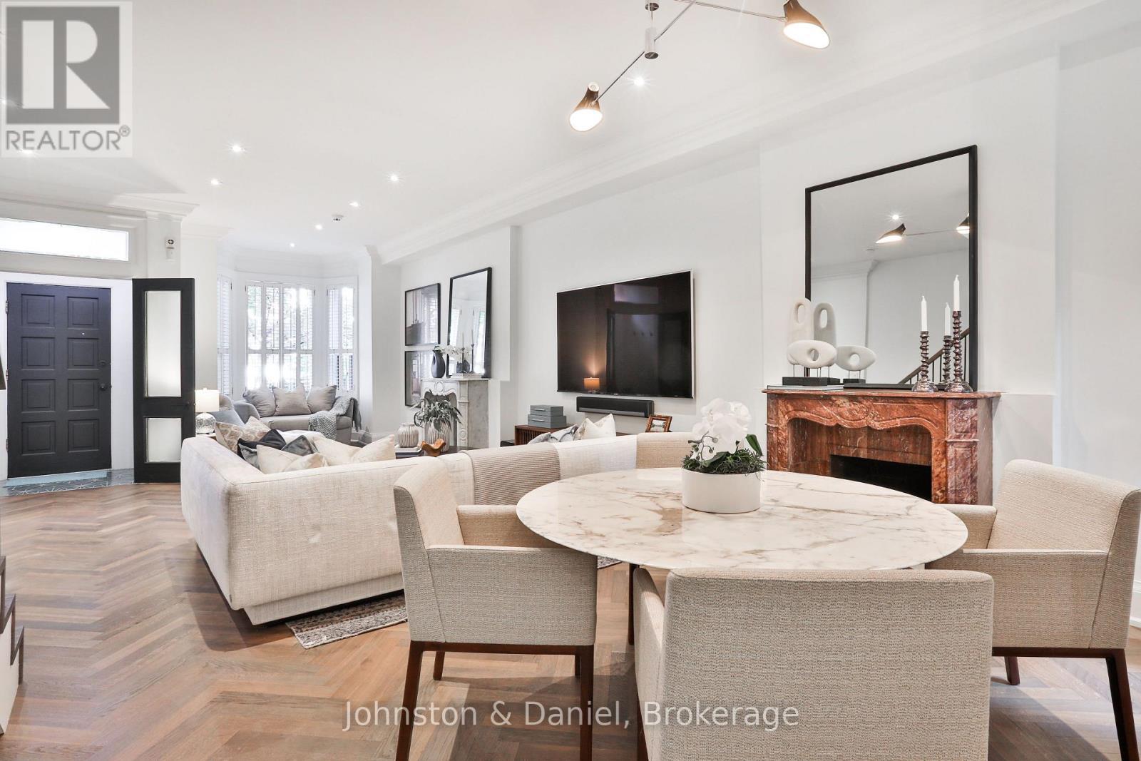 Elegant living, dining & bay window seating - 69 Sullivan Street, Toronto, ON